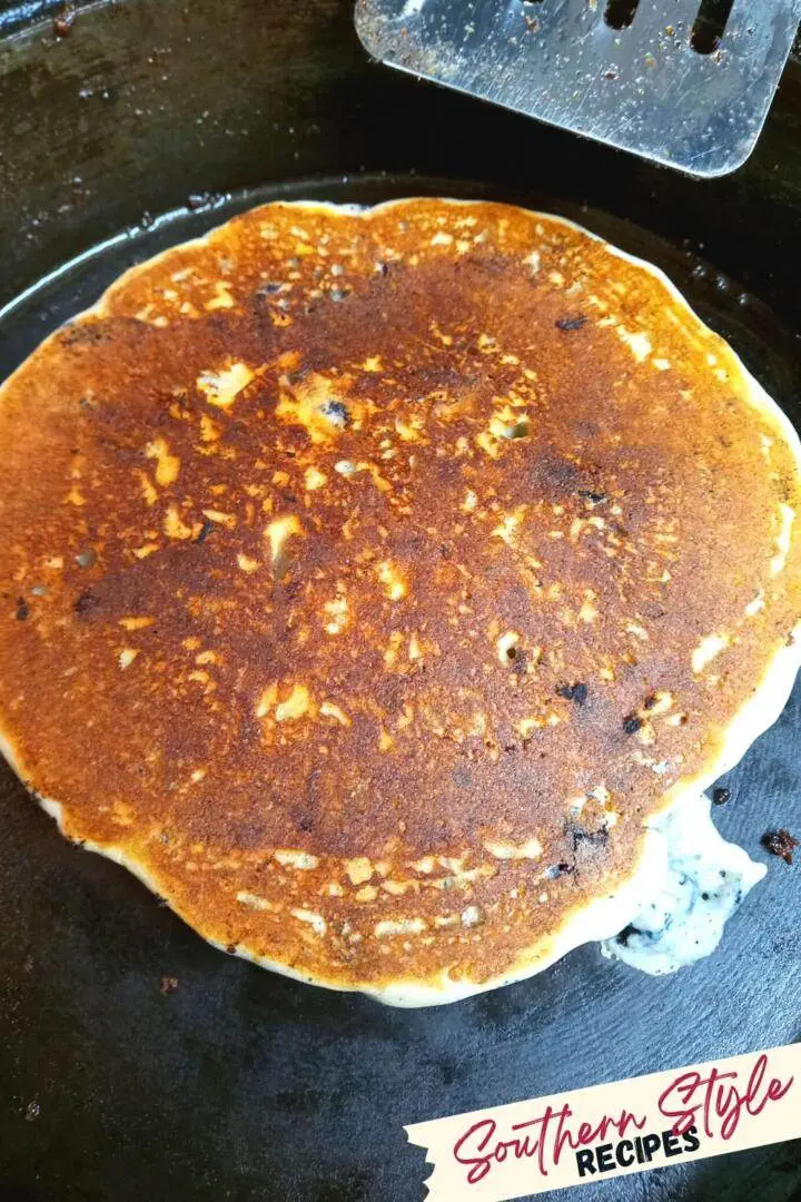 golden brown pancake in skillet